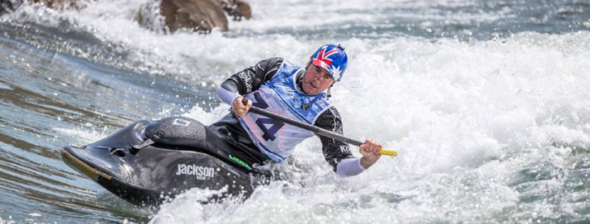 Jez Blanchard kayaking in rapids