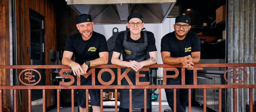 photo of three men at Sugar Creek Smokehouse