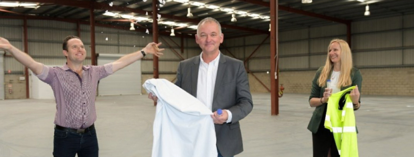 Deputy Mayor Jon Raven with BlockTexx co-founder Graham Ross and local Councillor Miriam Stemp at the company's new headquarters in Loganholme.