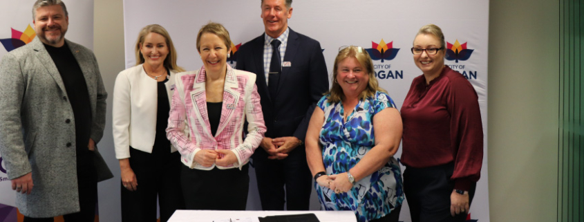 Logan Chamber President Stewart Fleming, Small Business Commissioner Maree Adshead, Minister for Employment and Small Business Di Farmer, Mayor Darren Power, Logan Regional Chamber President Chyerl Pridham, Beenleigh Yatala Chamber President Kerrie Saverin, signing the Small Business Friendly Council charter