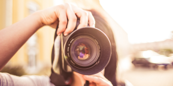 Image_A girl holding a camera