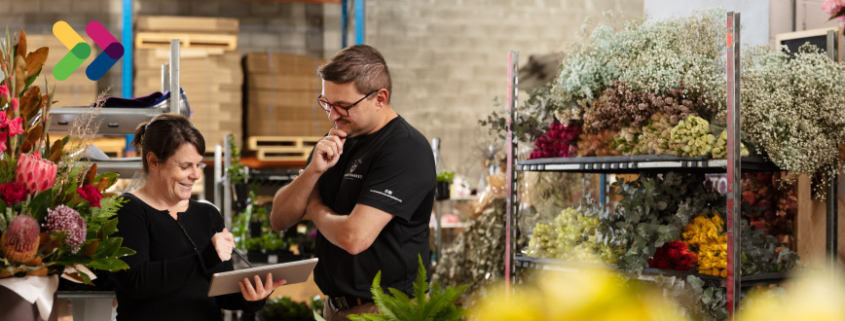 Council staff engaging with business owner at florist