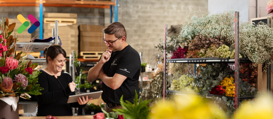 Council staff engaging with business owner at florist