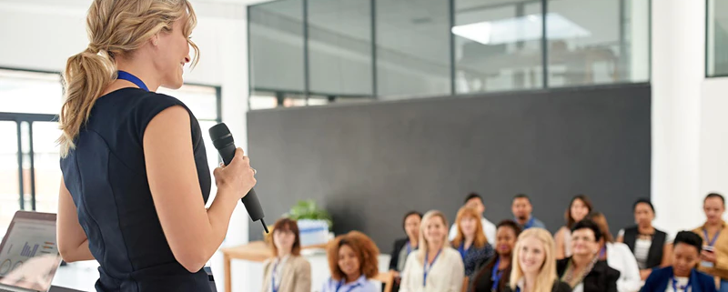 Image_a business woman giving a speech