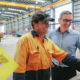 Image_A tradie showing a supervisor the manufacturing machine