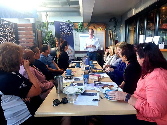 A group of people attending a networking event