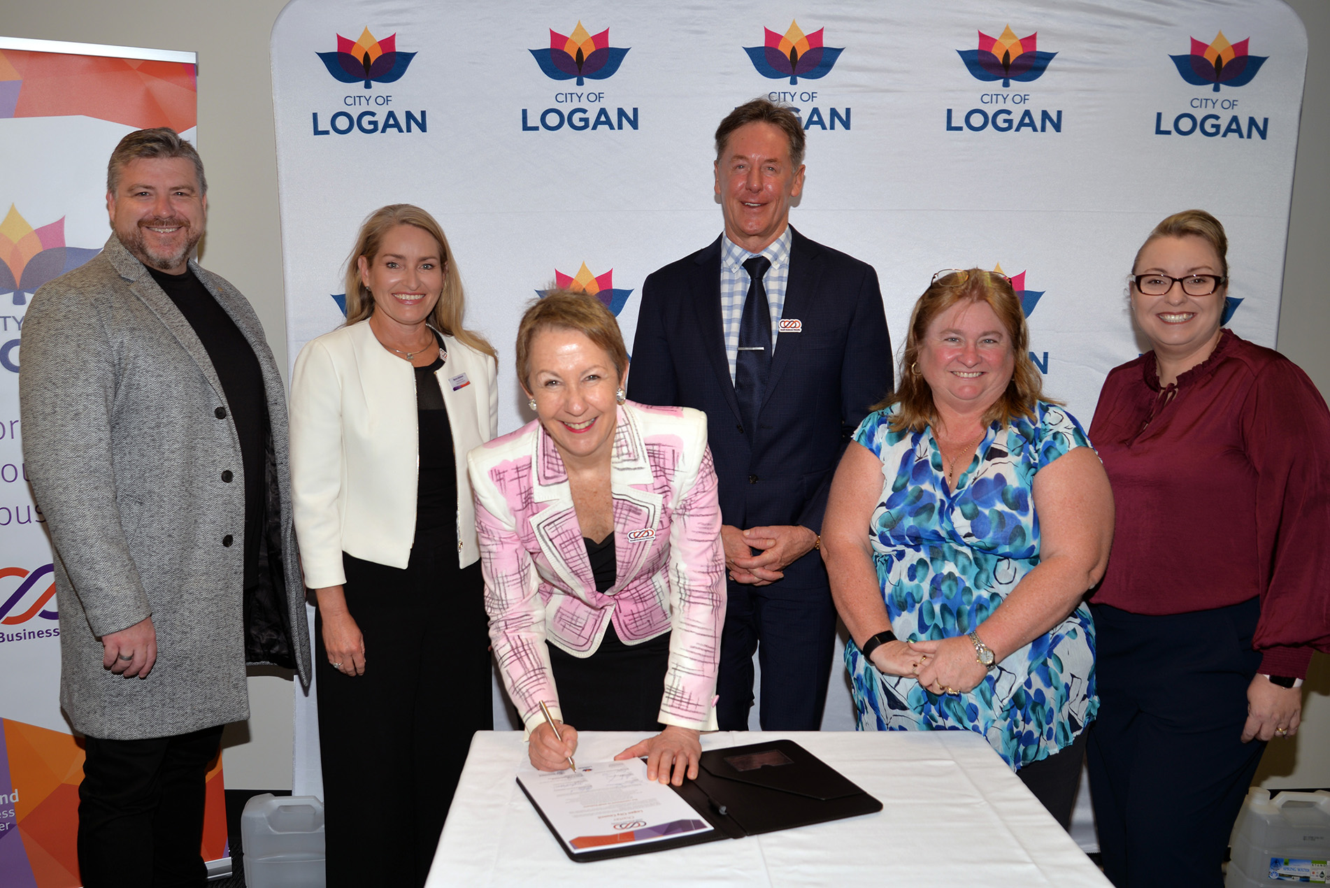Small Business Friendly - Minister Di Farmer (centre), with (from left) Stewart Fleming (Logan Chamber of Commerce), SB Commissioner Maree Adshead, Mayor Darren Power, Chyerl Pridham (Logan Regional CoC) and Kerrie Saverin (Beenleigh Yatala CoC)