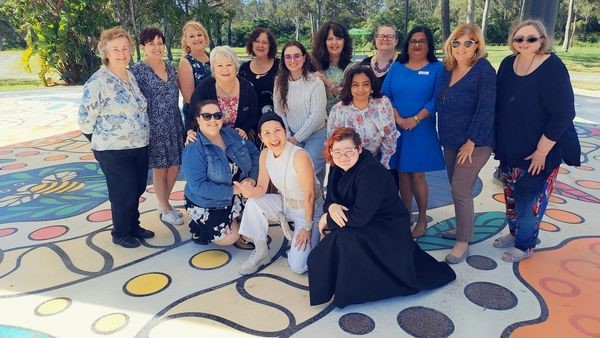 A group of Women smiling