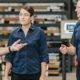 3 colleagues chatting at a manufacture