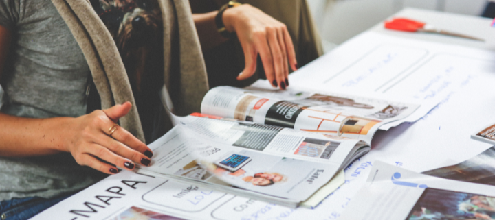A girl looking at a magazine