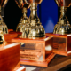 Trophies on the table says 2023 Logan Business Distinction awards