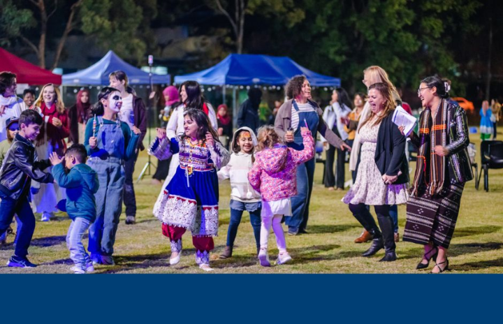 People enjoying a community event in a park