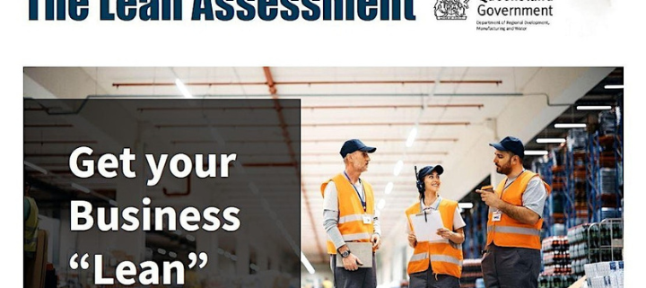 3 people wearing high-vis vest in a warehouse discussing