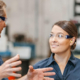 man and woman in workshop talking
