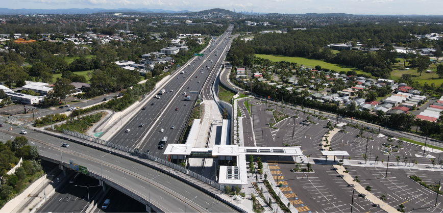 Aerial photo of Rochedale Park 'n' Ride looking north along the M1 and busway to Brisbane CBD 