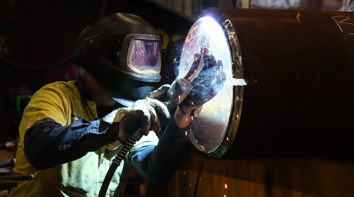 tradesman working in a steel manufacture